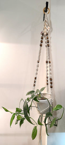 Macrame plant hanger (handmade by @sarasknots)